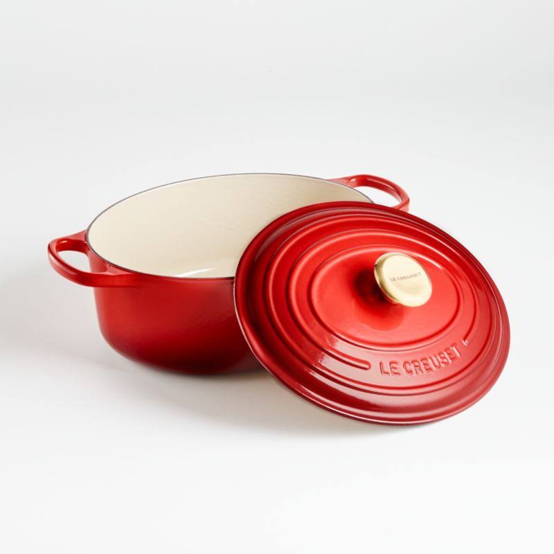Le Creuset 6.75 qt. Enameled Cast Iron Signature Oval Dutch Oven (Cerise with Gold Knob)