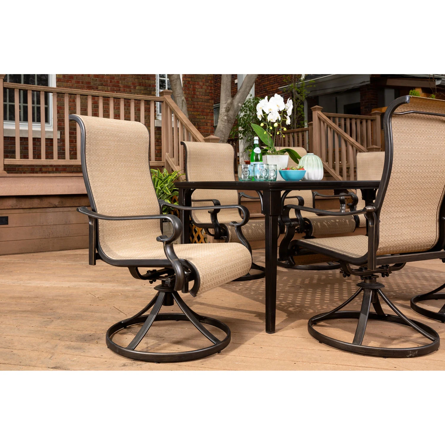 Hanover Brigantine 7-Piece Dining Set with an Expandable Cast-Top Dining Table and 6 Sling Swivel Rockers