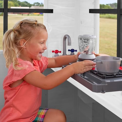 Backyard Discovery Beacon Heights Elevated Cedar Playhouse, Play kitchen, Powered Blender, Working Bell, 6 ft Wave Slide, Wrap-Around Deck