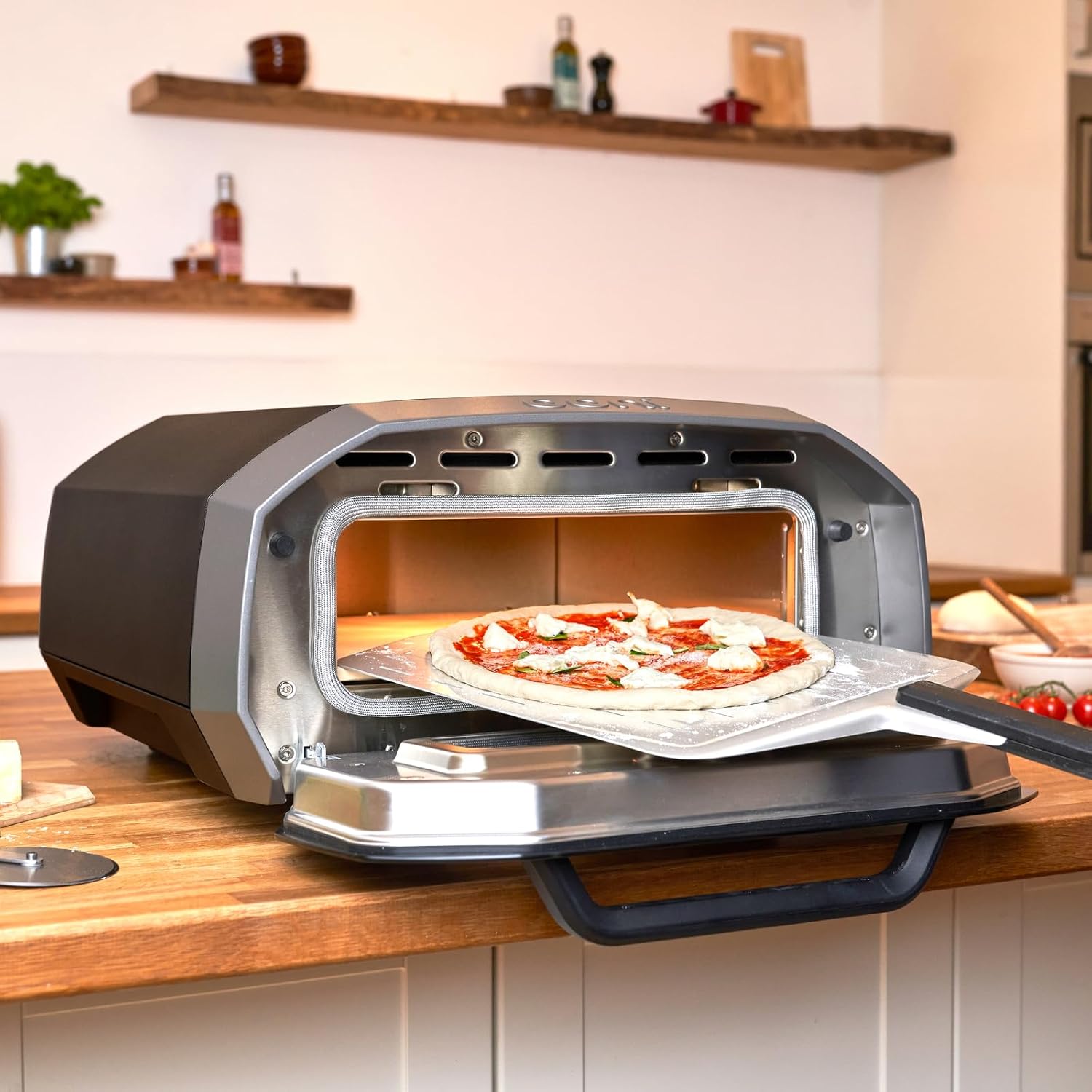 Ooni Volt 12 Electric Pizza Oven - Indoor & Outdoor Versatile Electric Oven, Pizza Cooker with Stone, Indoor and Outdoor Toaster Oven Countertop