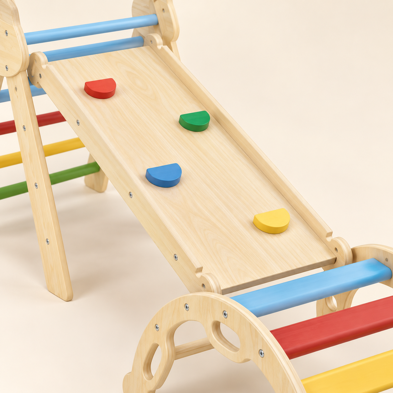 Reversible wooden ramp with colourful climbing holds and raised side rails