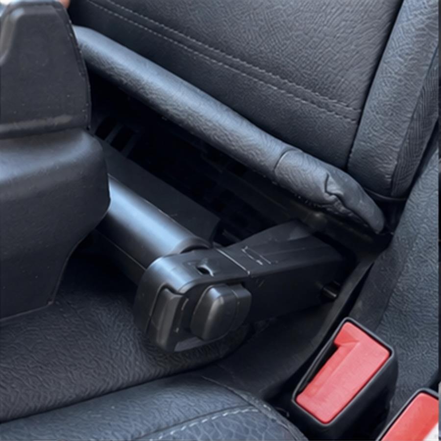 Vehicle docking base installed with its adjustable stability leg touching the rear floor