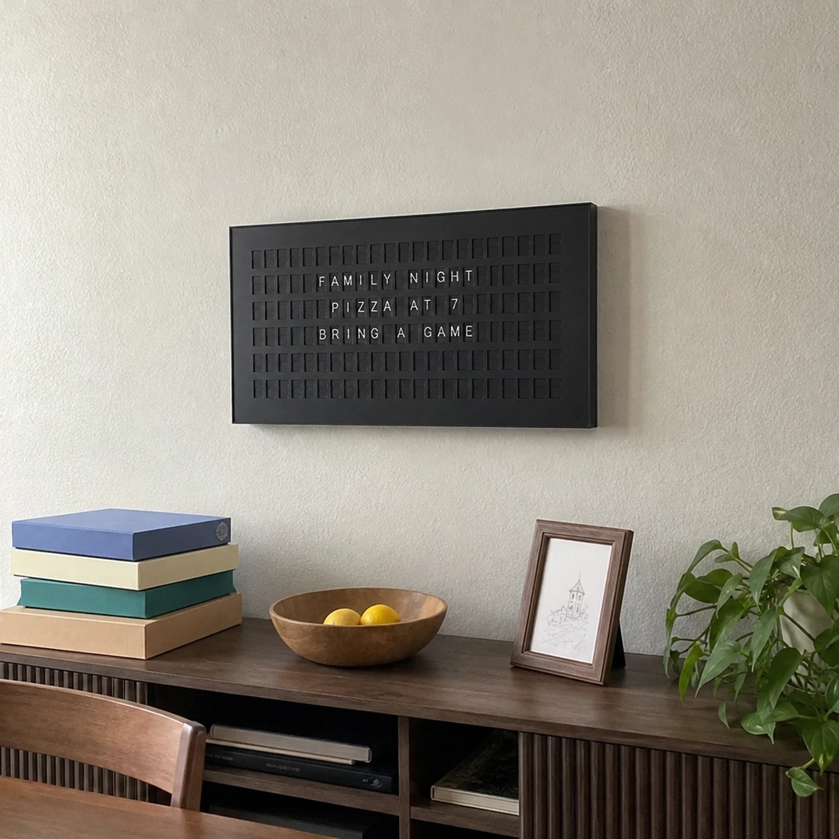Customer photo of a black 132 Bits display beside a family dining area