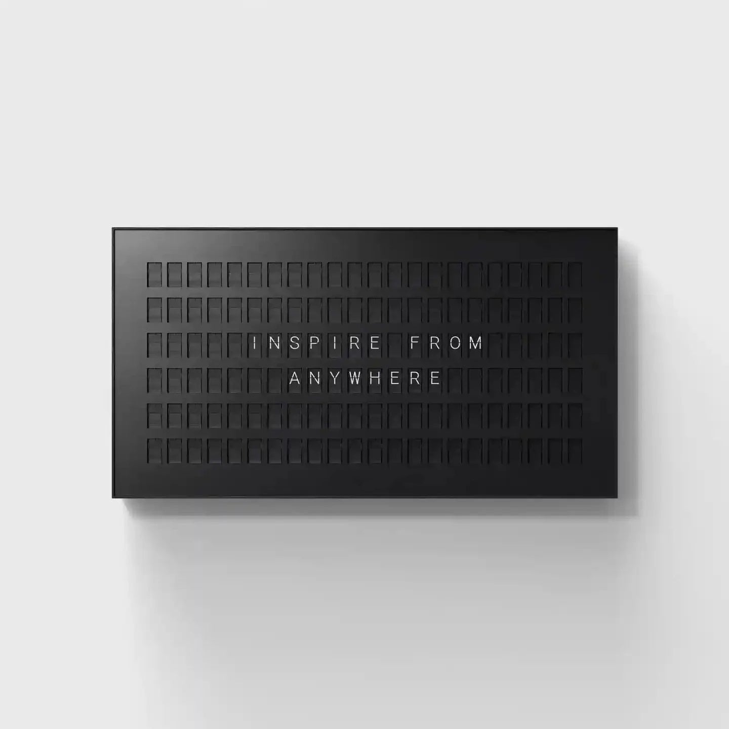 Black 132 Bits split-flap display — 22-column by 6-row layout