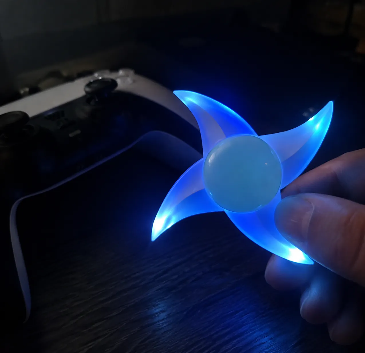 Customer using the blue glow near a gaming setup