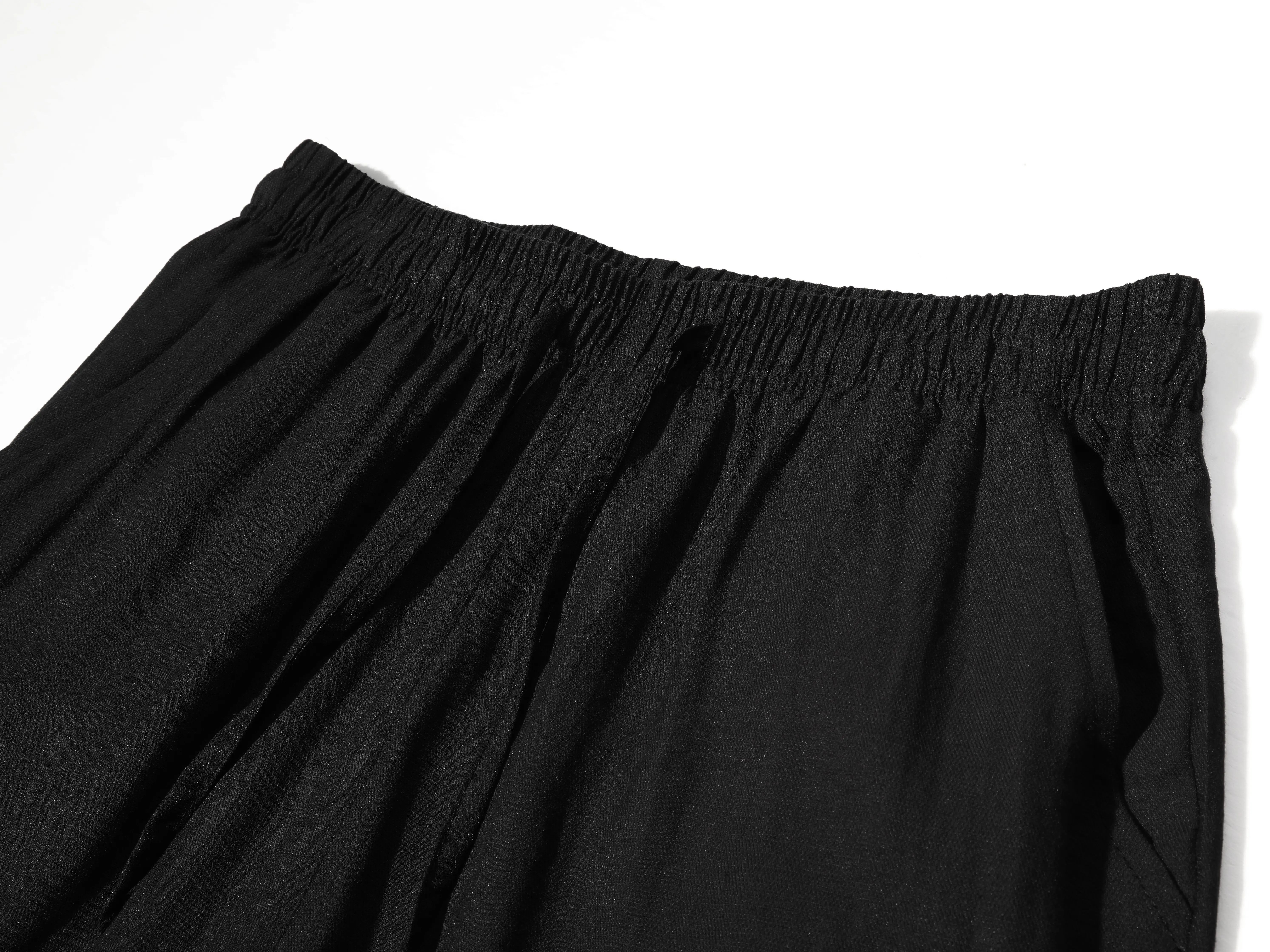 drawstring joggers for curvy/slightly fuller women, featuring a linen texture, high elastic waistband, loose wide legs