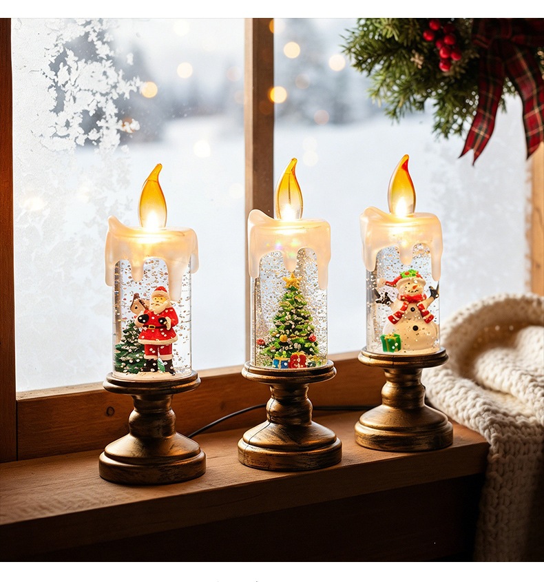 Three glowing Christmas candle lights on a windowsill