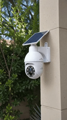 Solar powered simulated surveillance camera street light