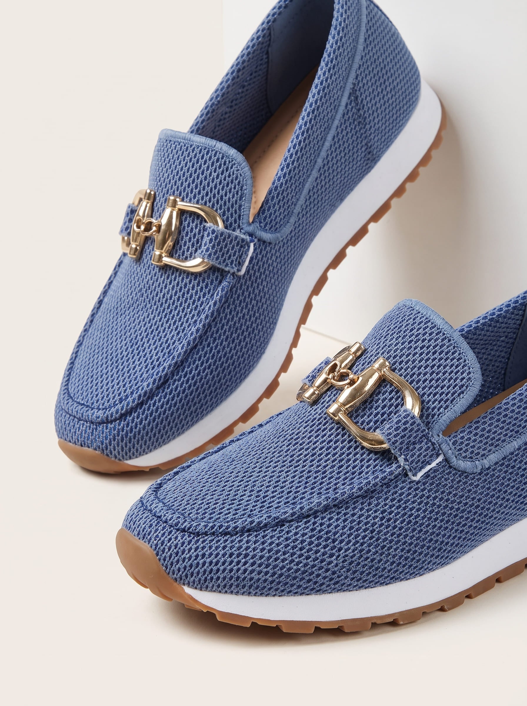 Women's navy blue mesh loafers with gold-tone buckle