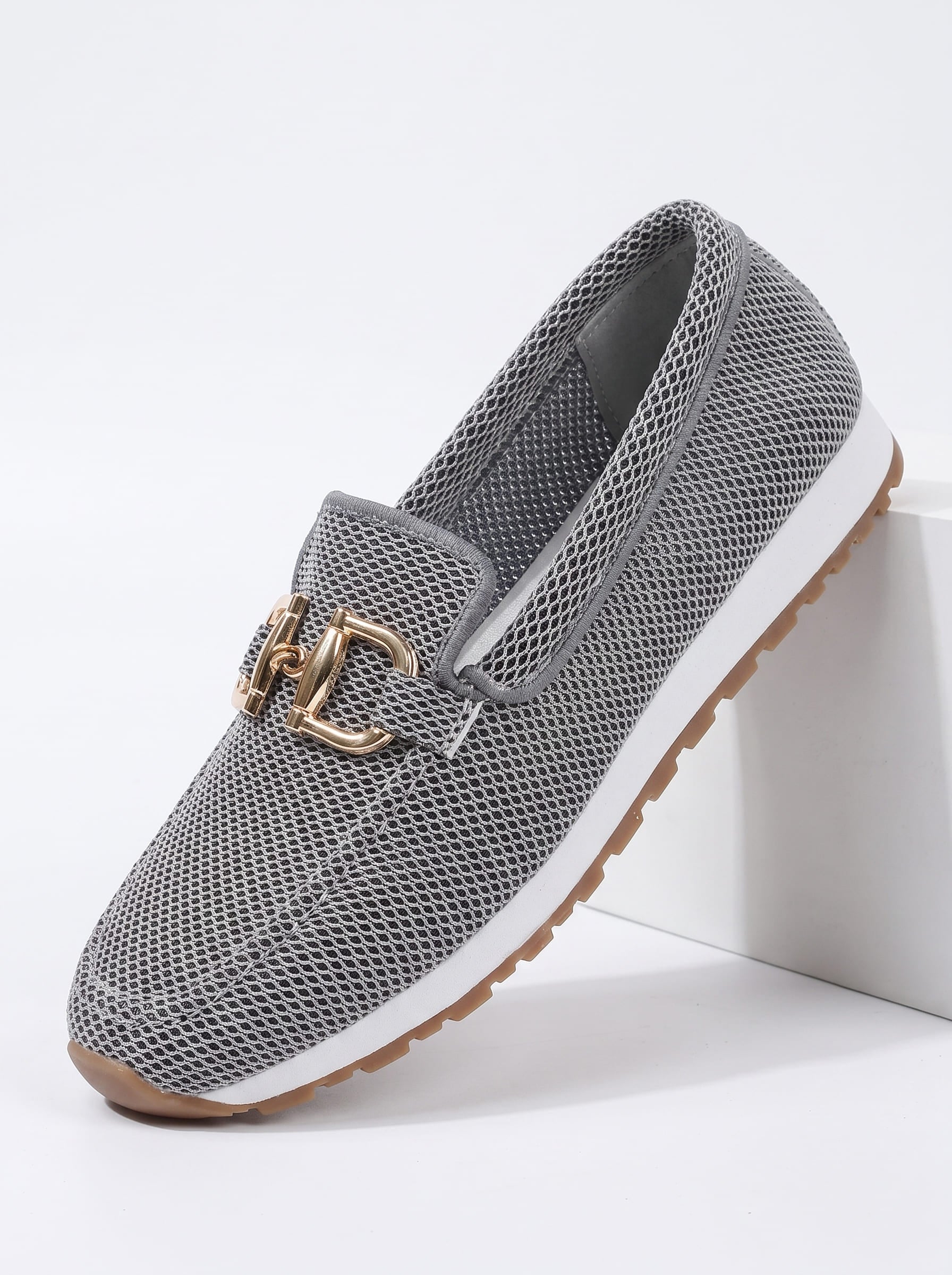 Side view of silver gray slip-on loafer