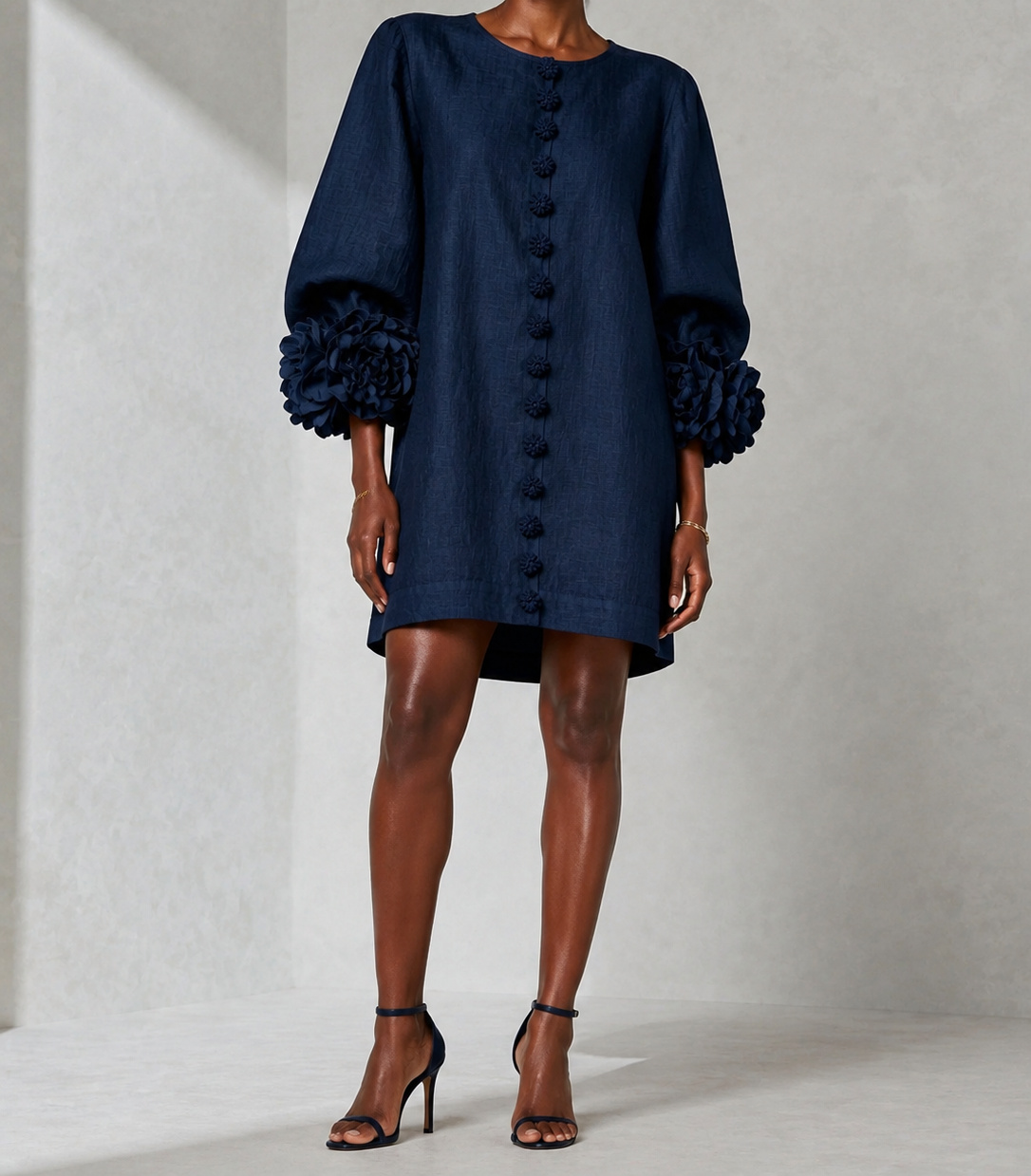 Navy Aurelia dress on a Black model