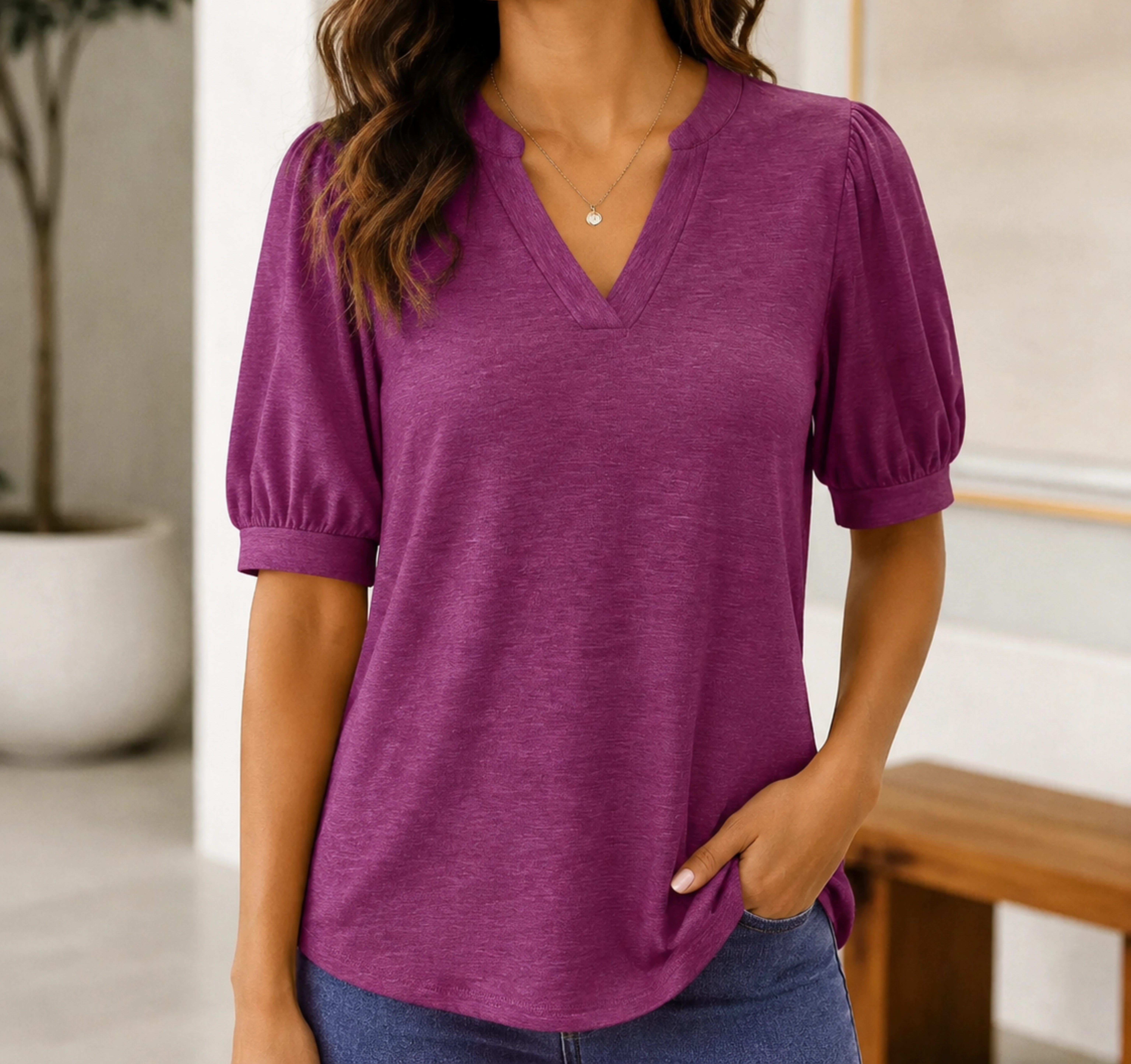 Plum Mara V-neck puff-sleeve top on a model