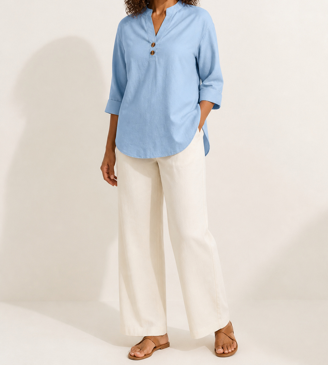 Light Blue Elara stretch slub linen-blend tunic blouse on an American model