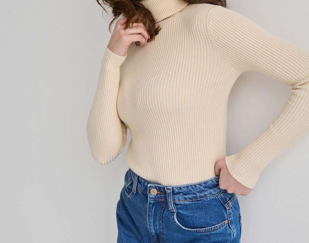 Ivory women's slim-fit ribbed mock-neck sweater