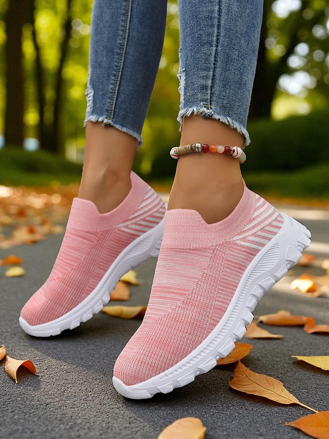 Women's Lightweight Knit Slip-On Walking Sneakers — Pink knit slip-ons on foot