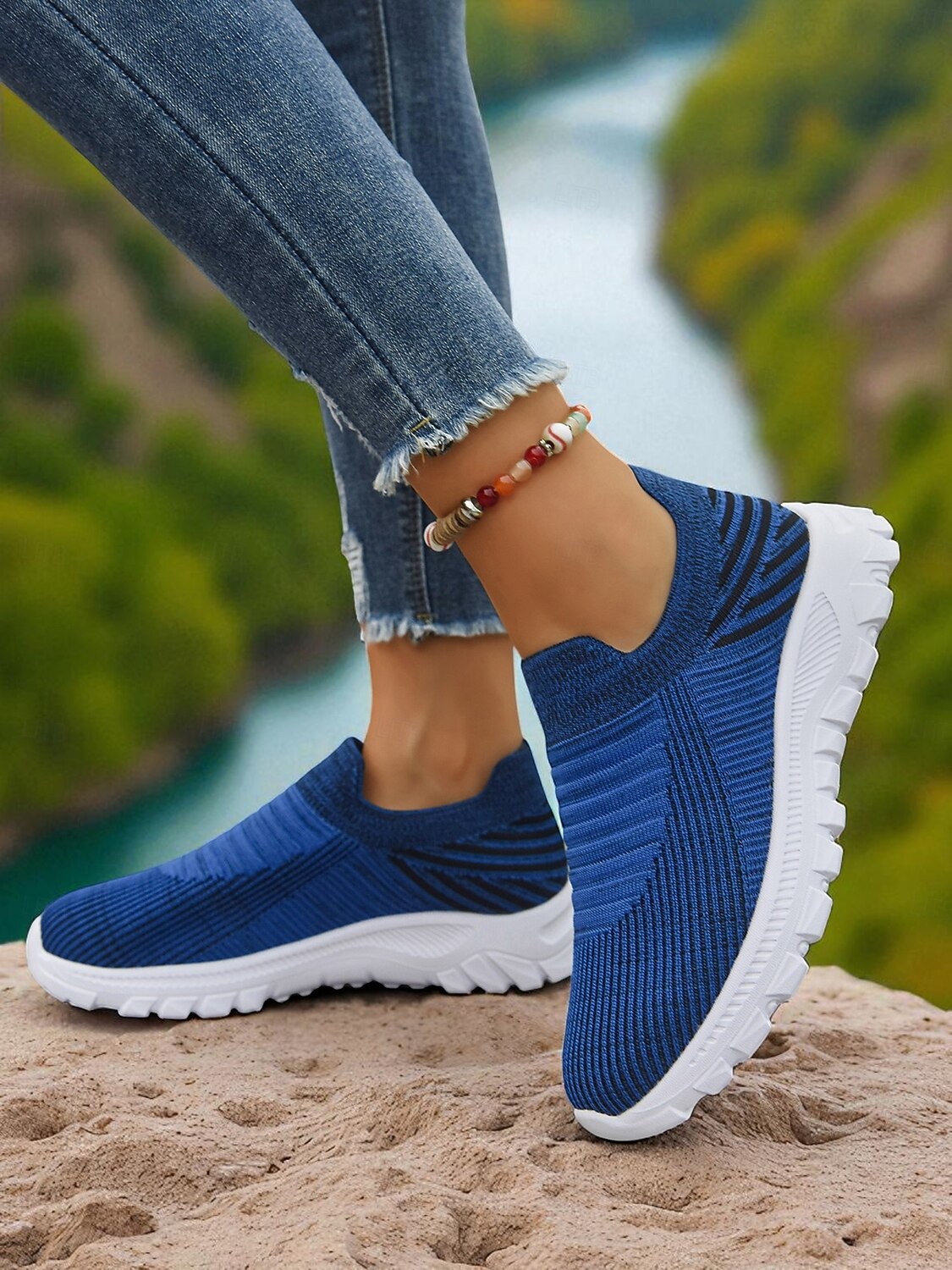 Women's Lightweight Knit Slip-On Walking Sneakers — Blue on-foot side view