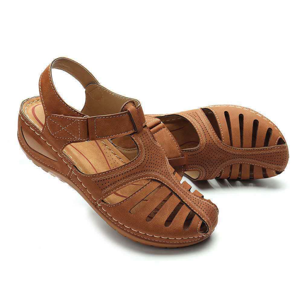 Brown adjustable cutout wedge sandals