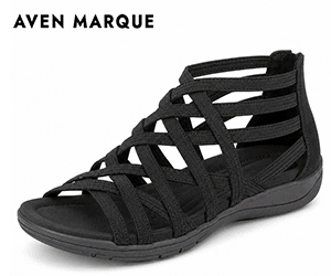 Foot entering the Black multi-strap gladiator sandal