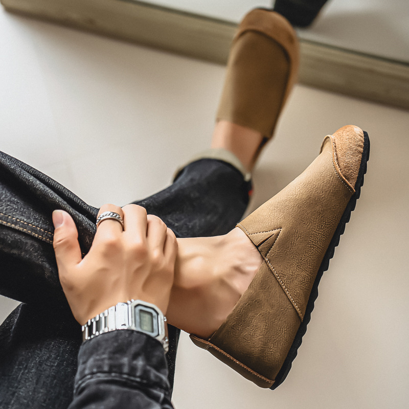Khaki slip-on casual shoes shown on foot