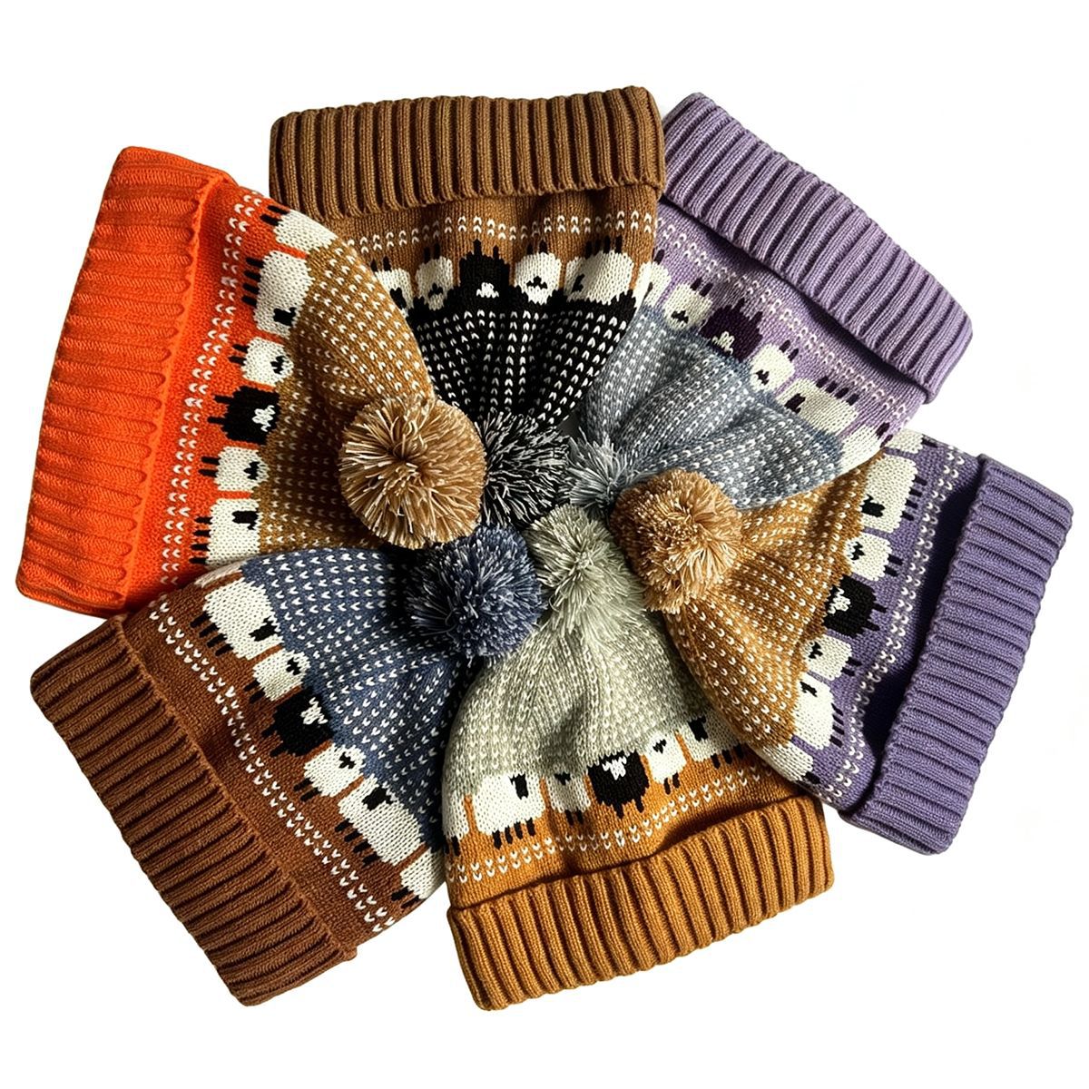 Seven colorways of sheep-pattern Fair Isle pom-pom beanies