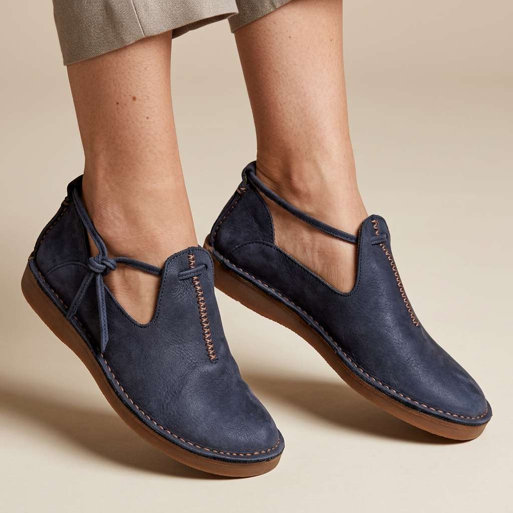 Delaina Women's Vintage Cutout Lace-Up Flats — Blue lace-up flats on foot