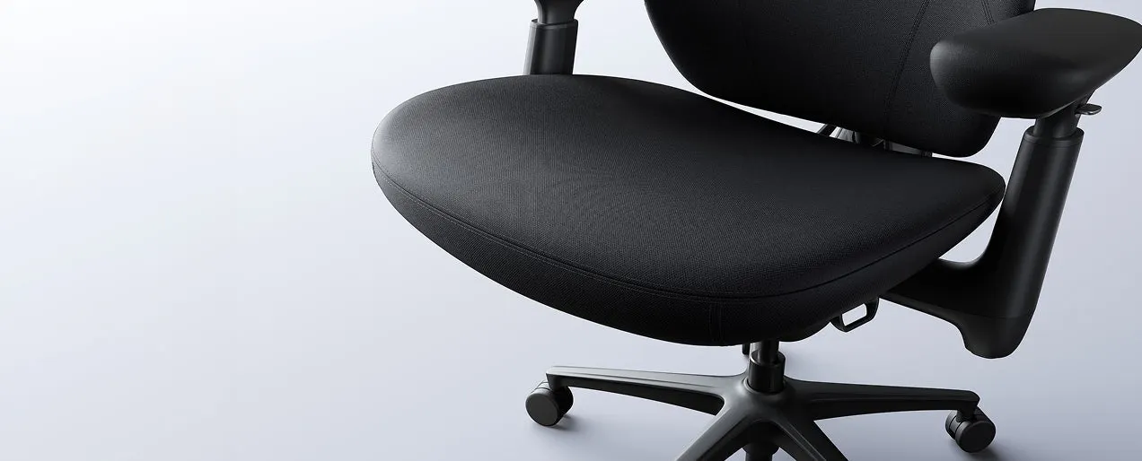 Close view of the chair's spacious upholstered seat