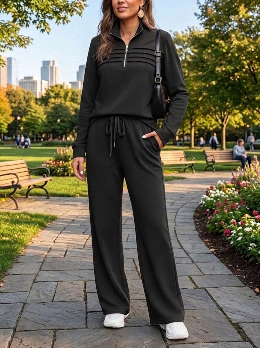 Women's black quarter-zip two-piece travel set
