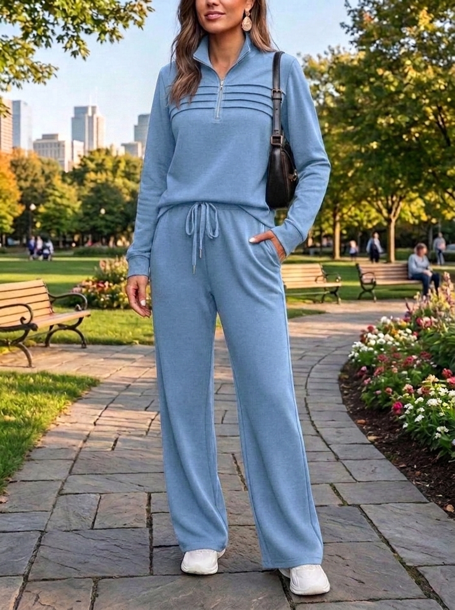 Women's blue quarter-zip two-piece travel set