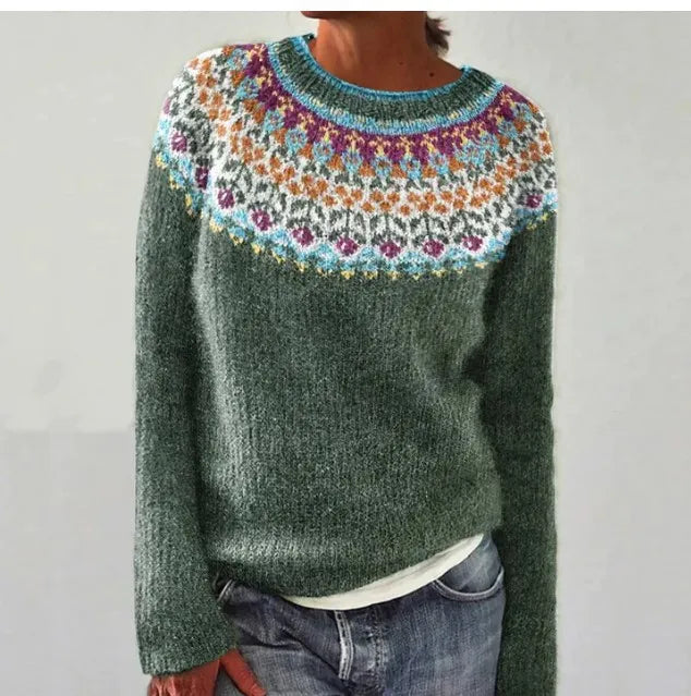 Women's green knit sweater with a colorful Fair Isle pattern