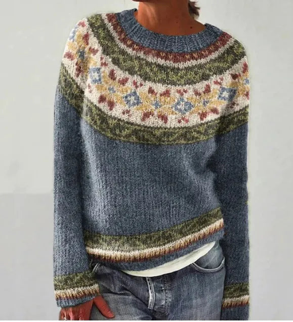 Women's blue knit sweater with a vintage Nordic pattern