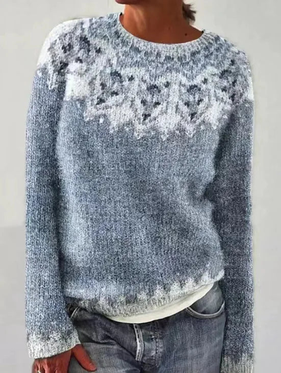 Women's gray knit sweater with a winter-inspired pattern