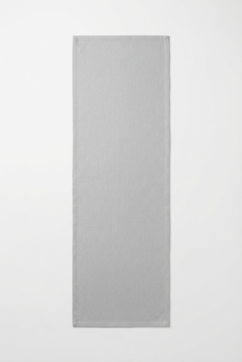 Light gray cotton dining table runner on neutral background