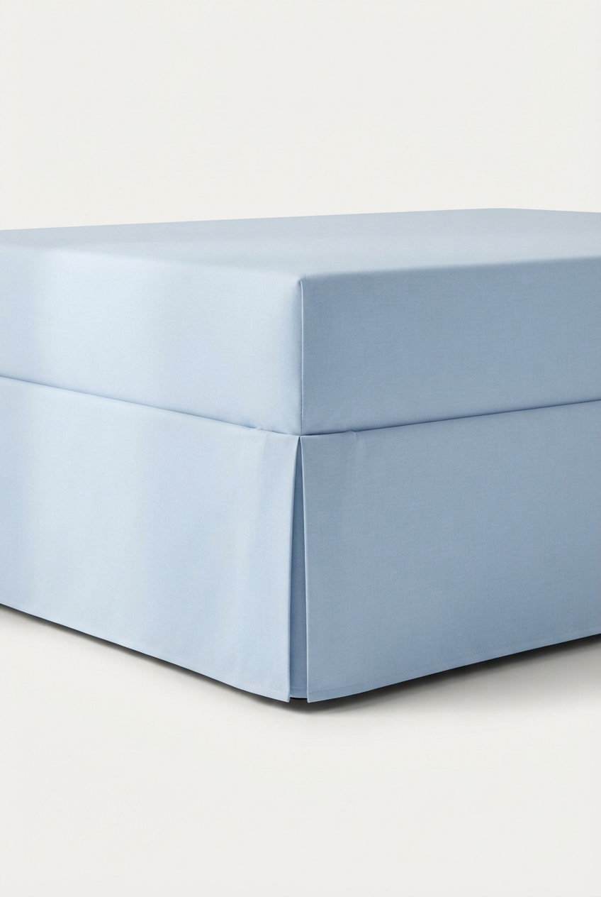 Light blue tailored bed skirt with clean straight lines