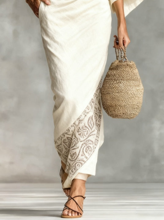 White loose-fitting top and printed skirt set