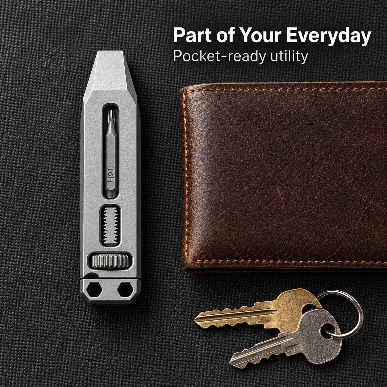 Everyday titanium tool beside a wallet and keys
