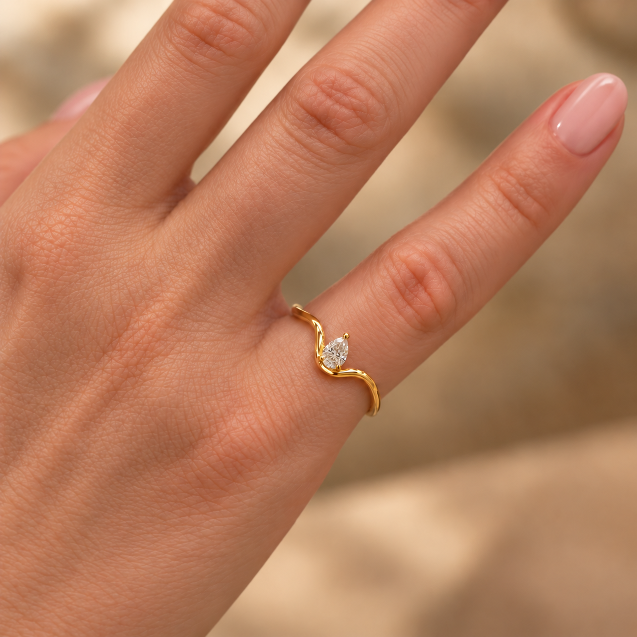 Pear-Shaped Diamond Wave Ring