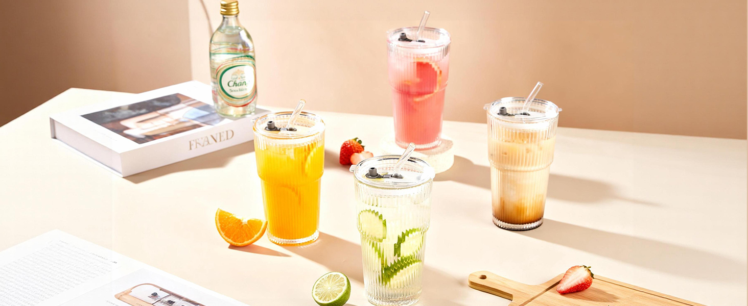 ribbed glass tumbler with straw and lid