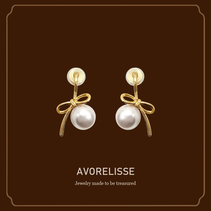 Lumière Bow Butterfly Pearl Clip-On Earrings — Edition 50 product image 1