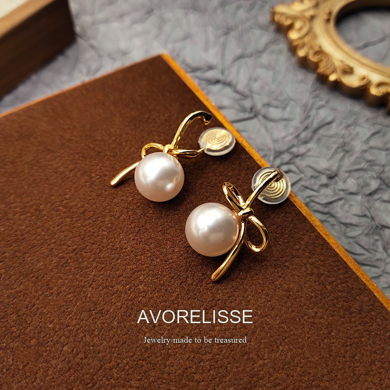 Lumière Bow Butterfly Pearl Clip-On Earrings — Edition 50 product image 4