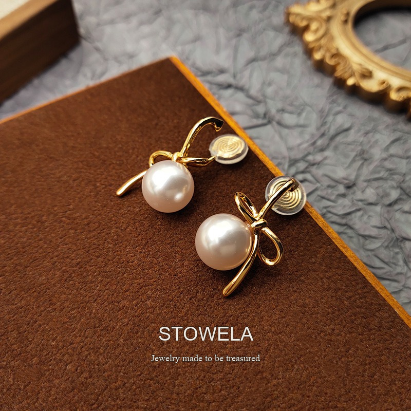 Lumière Bow Butterfly Pearl Clip-On Earrings — Edition 50 product image 4