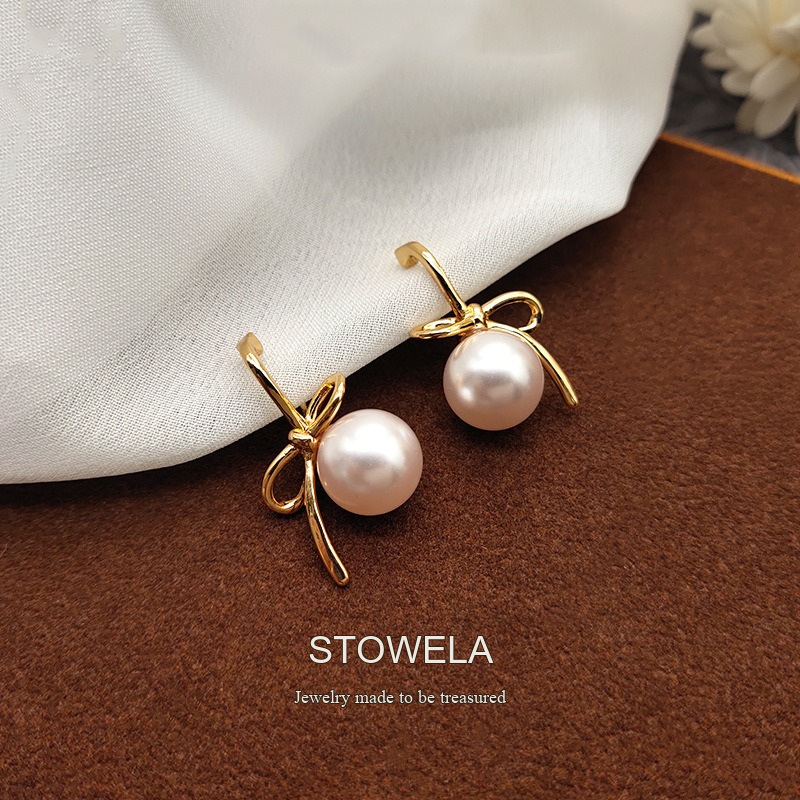 Lumière Bow Butterfly Pearl Clip-On Earrings — Edition 50 product image 5