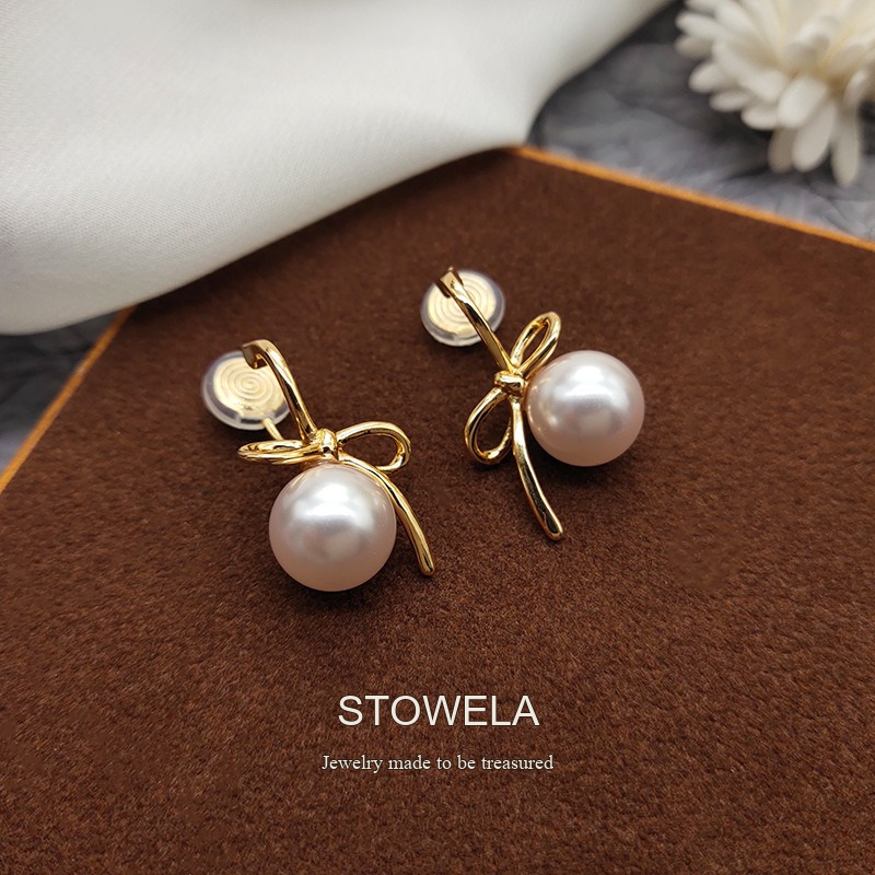 Lumière Bow Butterfly Pearl Clip-On Earrings — Edition 50 product image 6