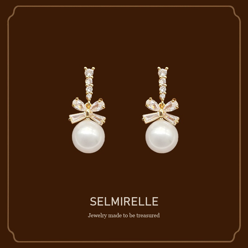 Noelle Bow Butterfly Pearl Clip-On Drop Earrings Selmirelle cover image
