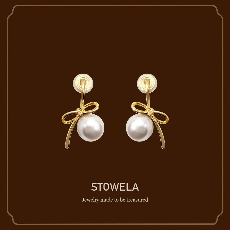 Lumière Bow Butterfly Pearl Clip-On Earrings — Edition 50 product image 1