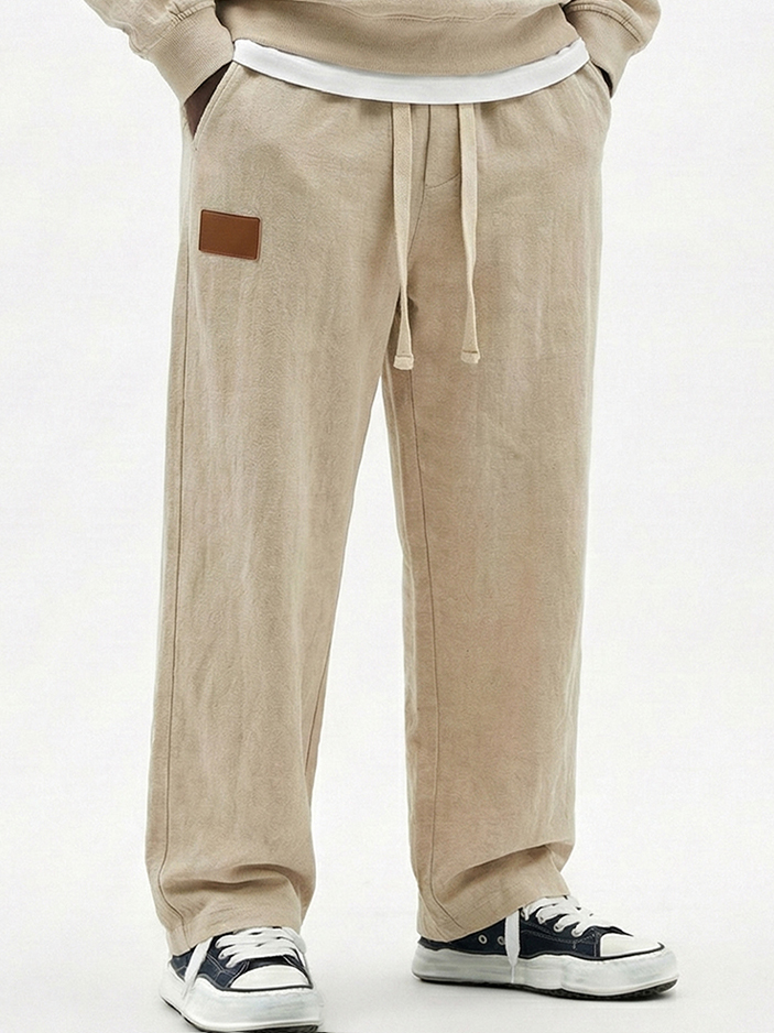 Men's Breathable Cotton-linen Textured Pants with Leather Embroidery Patchwork