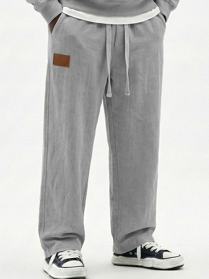 Men's Breathable Cotton-linen Textured Pants with Leather Embroidery Patchwork