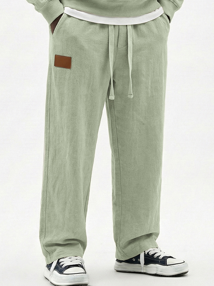 Men's Breathable Cotton-linen Textured Pants with Leather Embroidery Patchwork