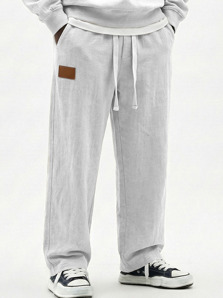Men's Breathable Cotton-linen Textured Pants with Leather Embroidery Patchwork