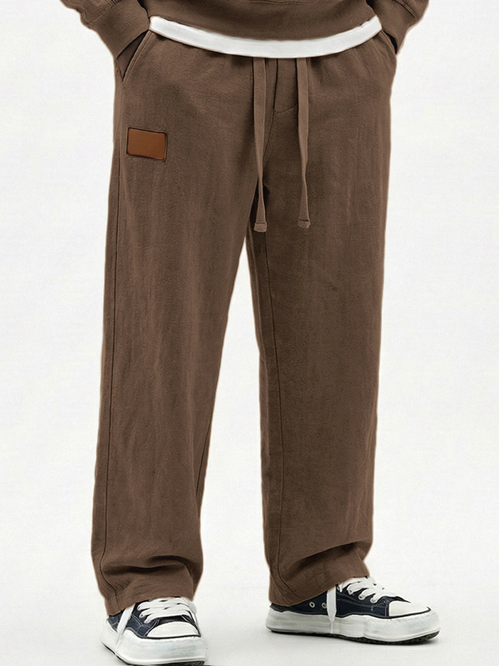 Men's Breathable Cotton-linen Textured Pants with Leather Embroidery Patchwork