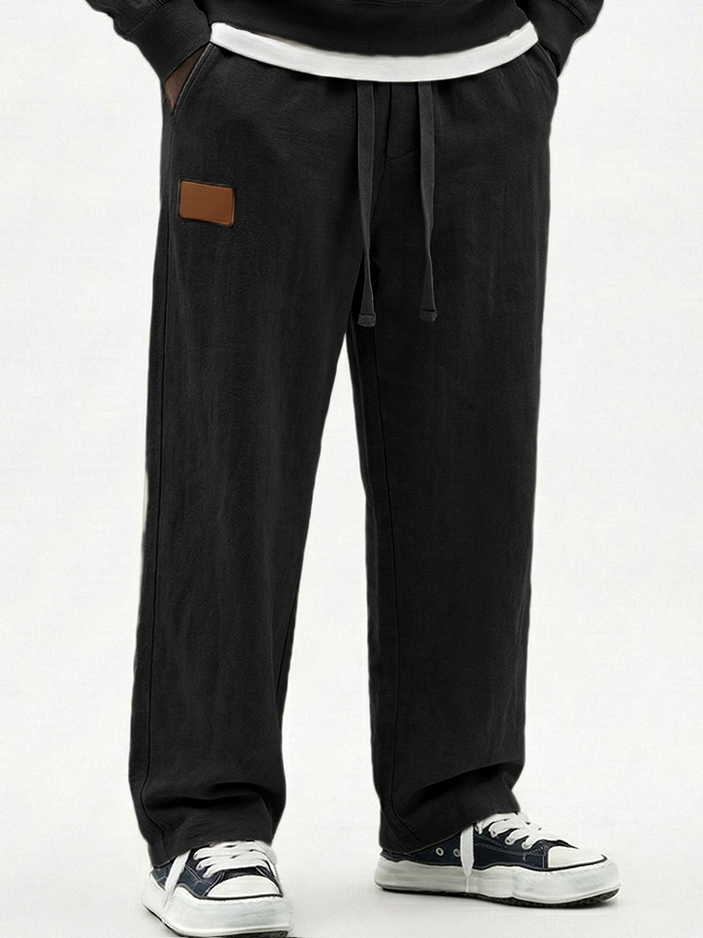Men's Breathable Cotton-linen Textured Pants with Leather Embroidery Patchwork